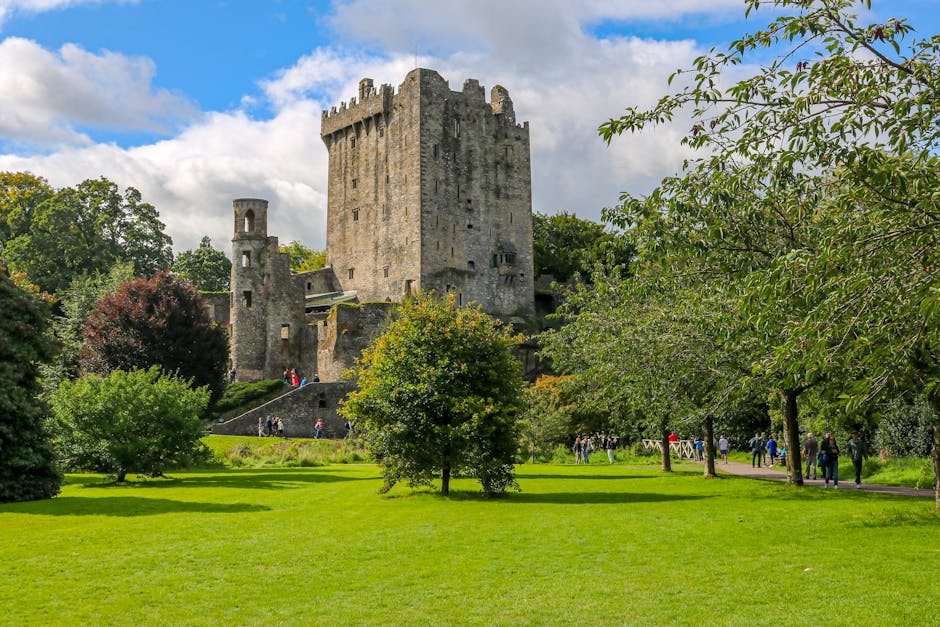 pexels-photo-18689412-18689412 Scenic view of Blarney Castle surrounded by lush greenery in Blarney, Ireland.
