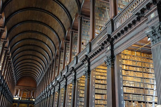 Expansive view of the historic Long Room library in Trinity College Dublin.