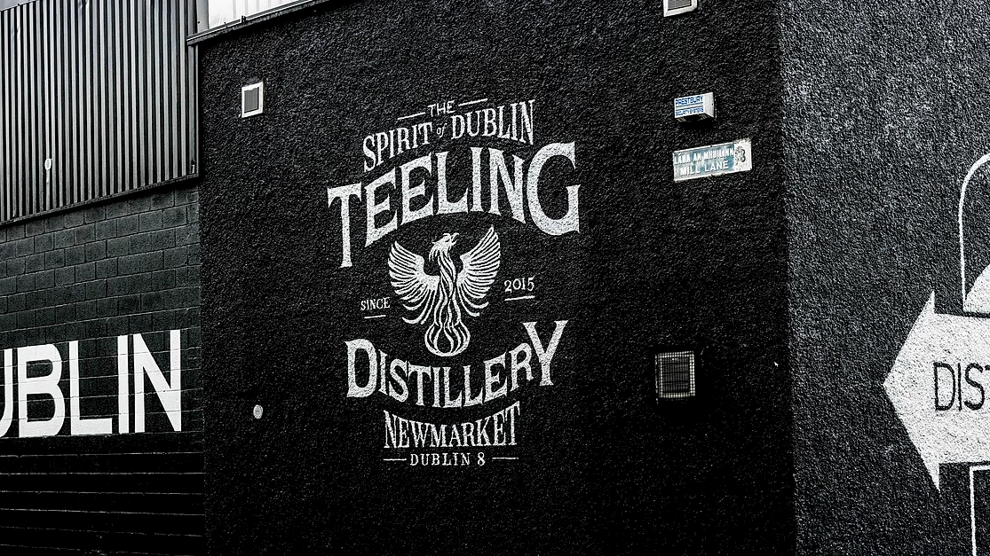 Expansive view of the historic Long Room library in Trinity College Dublin.